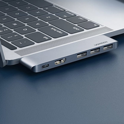 USB-C UGREEN razširitveni razdelilec za Apple MacBook Pro / Air serijo, 3 x USB-A 3.0 - 1 x USB-C - 1 x HDMI, Siva